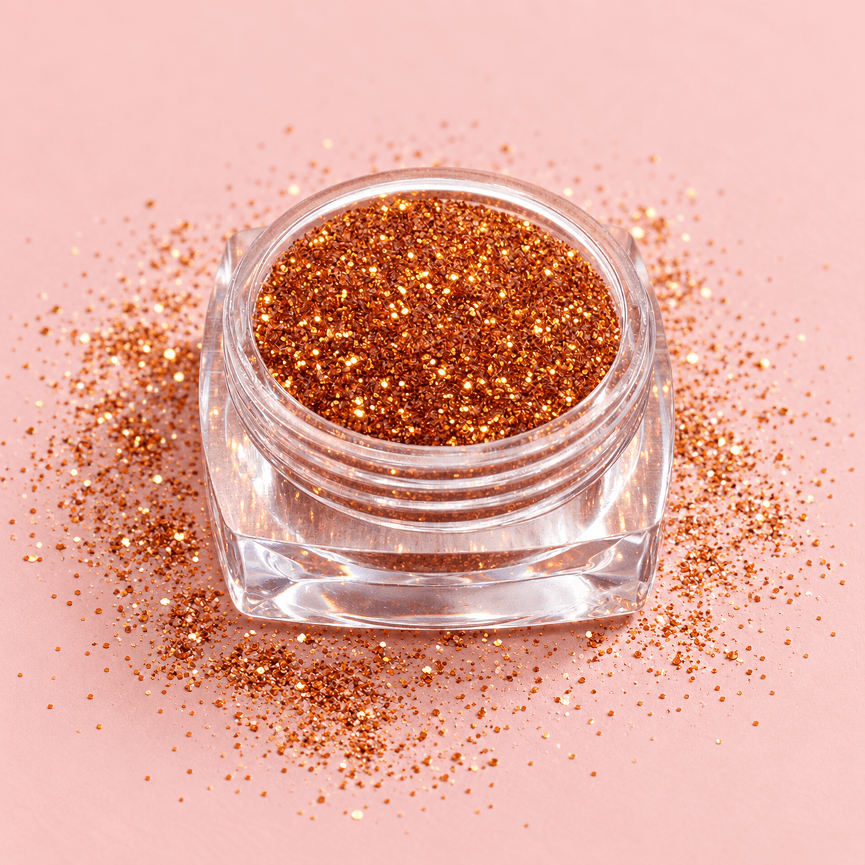 SHEGLITTARY golden loose glitter jar – studio photo